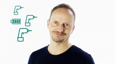 Portrait of Dietrich Kuhlgatz, Head of Historical Communications at Bosch, on a white background with screwdriver and battery icons next to him.